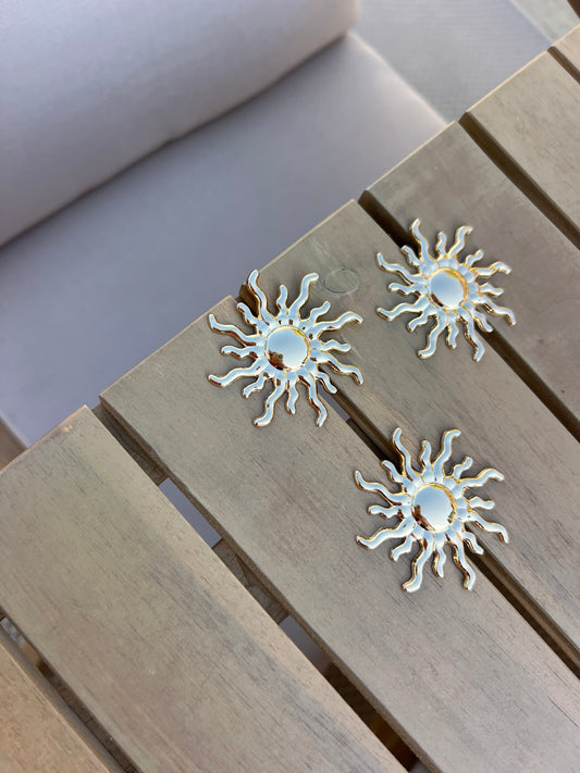 Broche soleil